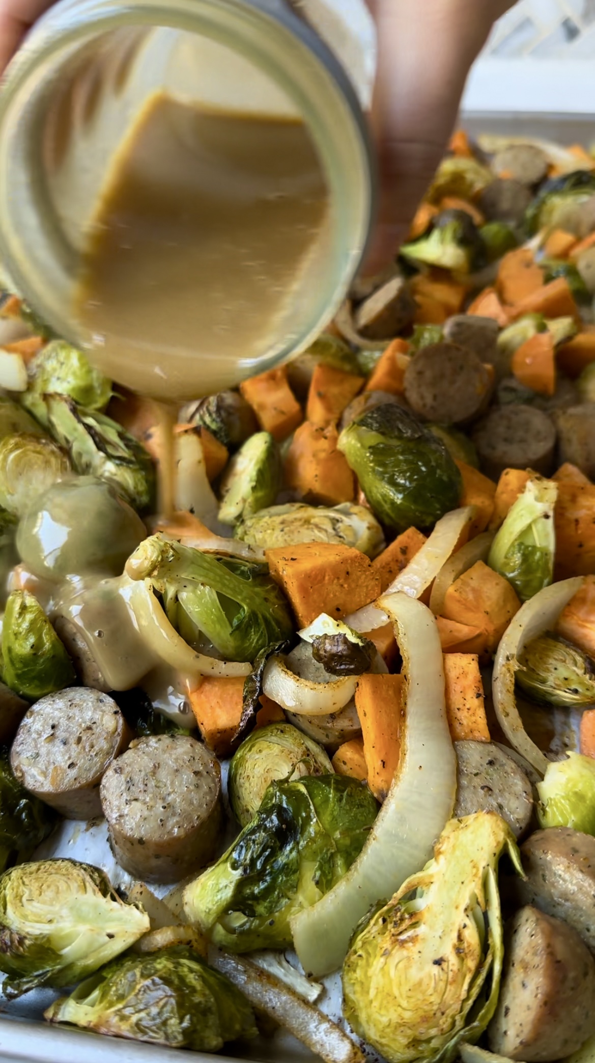 This sheet pan sausage with sweet potatoes and Brussels sprouts makes ...