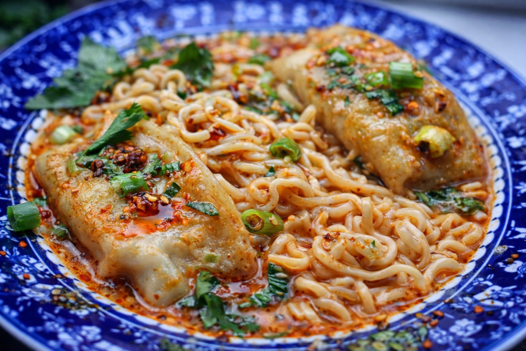 a bowl of coconut curry dumpling ramen 